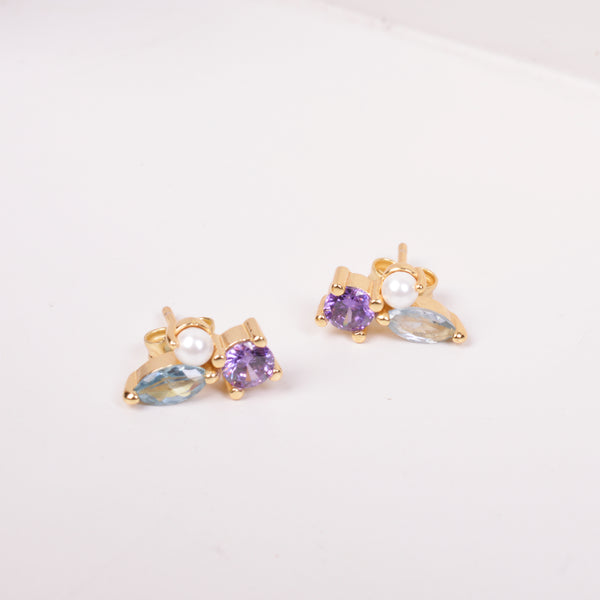 25-73177 Studs perla zirconias morado y azul