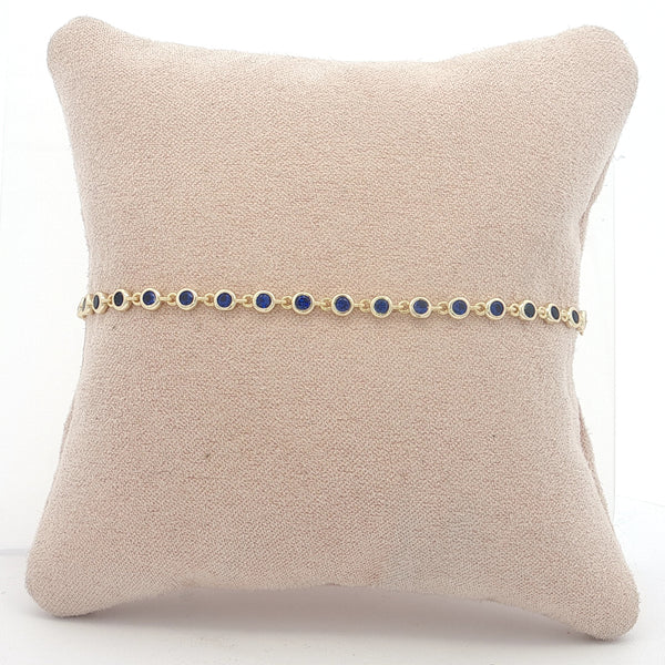 04973 Pulsera bezels azul dorada