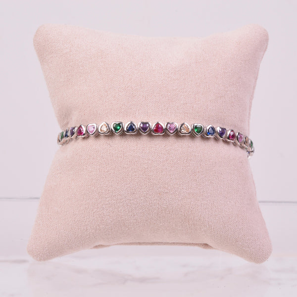 25-0215 Pulsera tennis de corazones colores plateada 17 cm