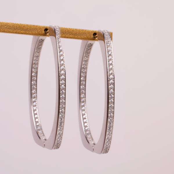 731049 Arracadas ovalo zirconias plateado